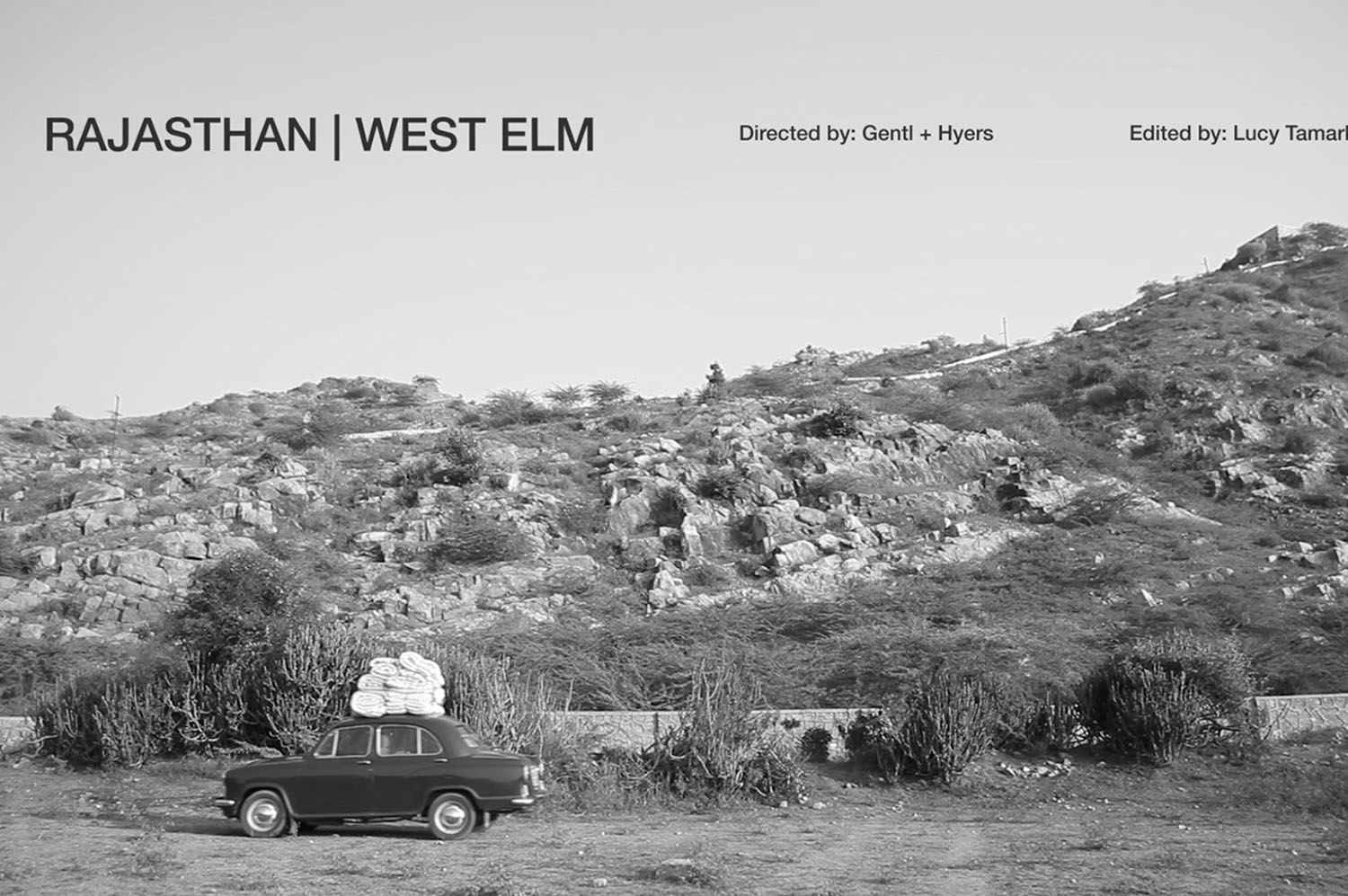 Rajasthan | West Elm film still of a car driving through a rocky landscape